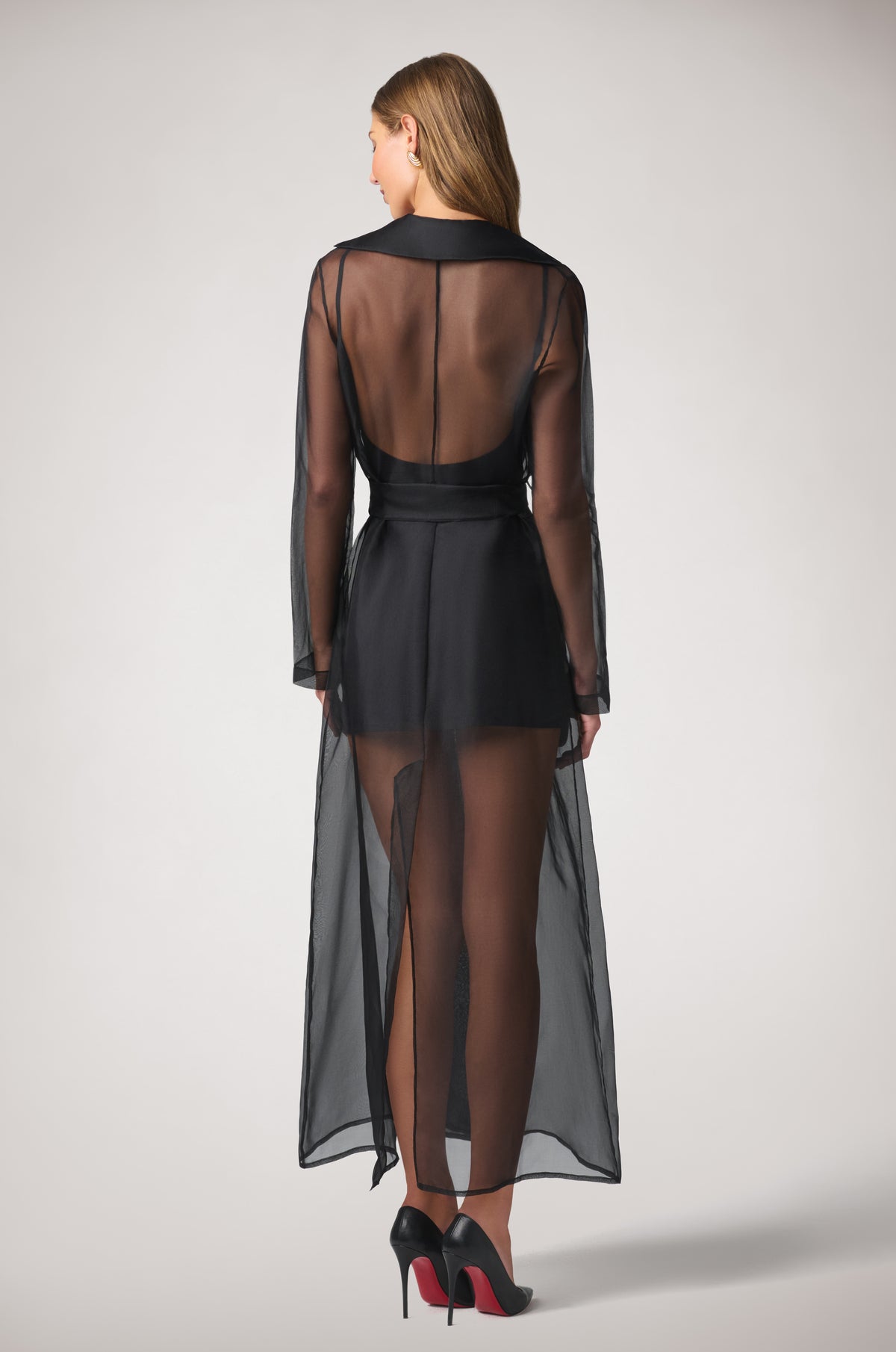 Kiki de Montparnasse Soie Organza Trench Coat in sheer 100% silk organza, featuring a fluid translucent silhouette and classic trench detailing, shown from the back.
