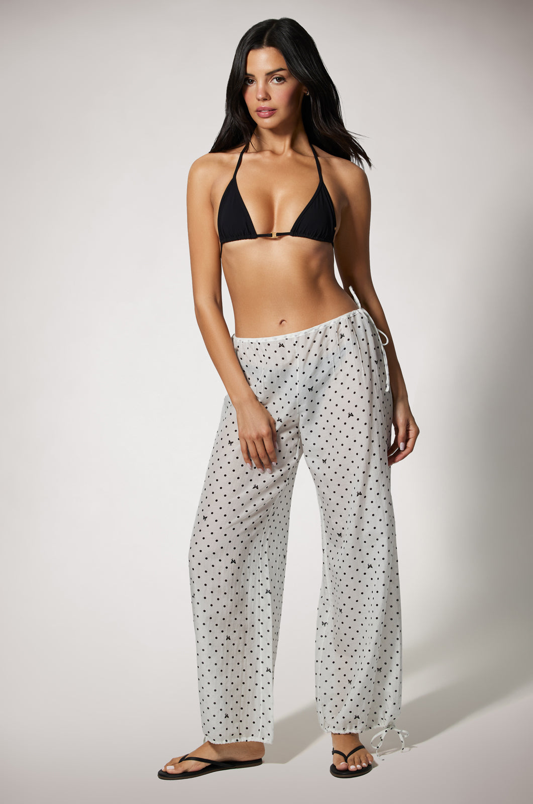 Airy pant cover-up resortwear with tie waist and ankle ties in custom Kiki point print front
