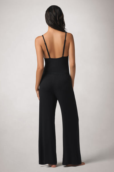 Kiki de Montparnasse Le Boy Bodysuit in black stretch rib knit with track pant back