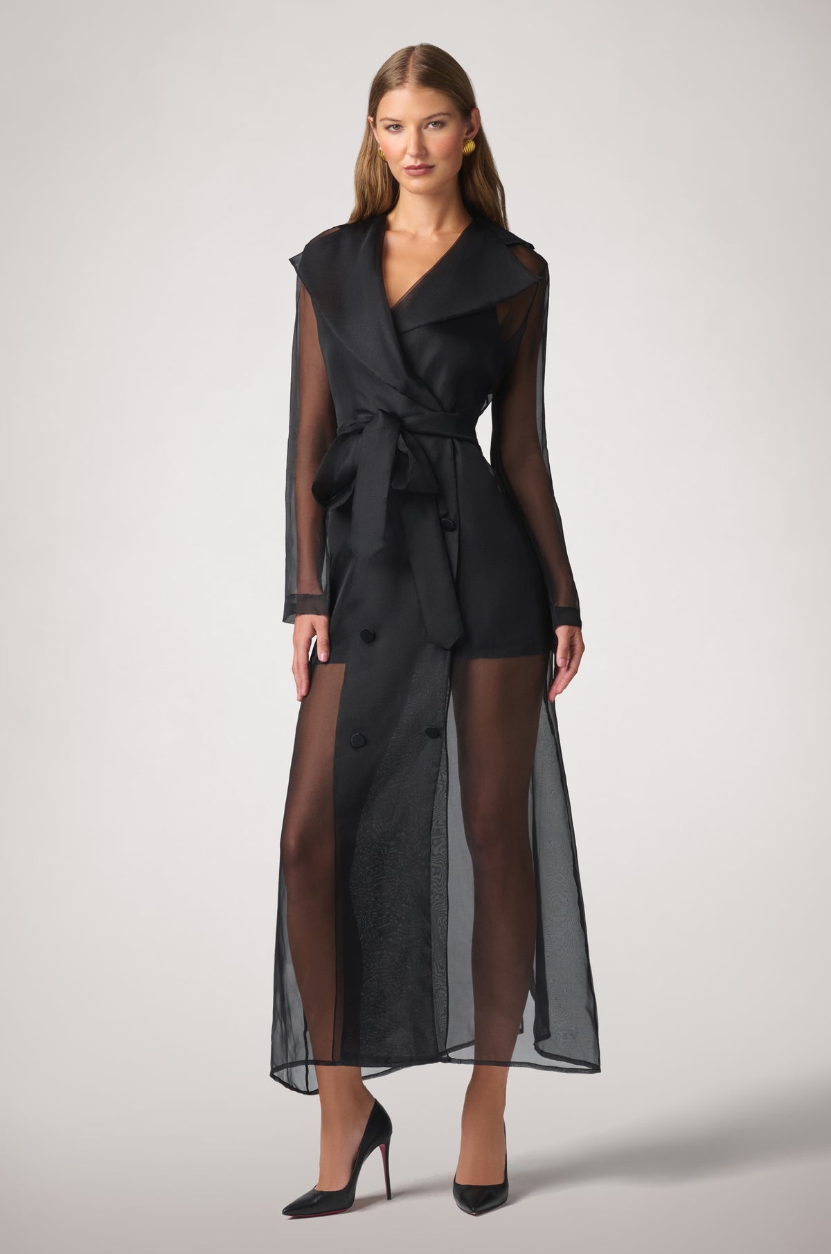 Kiki de Montparnasse Soie Organza Trench Coat in sheer 100% silk organza, featuring a fluid translucent silhouette, classic trench details, and a waist-defining belt, shown from the front.