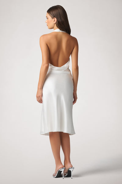 Kiki de Montparnasse fluid silk charmeuse halter with an open back and silk-covered buttons at the back of the neck, shown from behind.