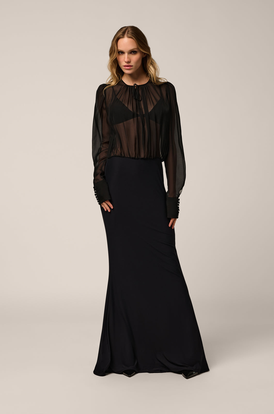 Long sleeve maxi dress with open tie in front and chiffon-covered buttons front view