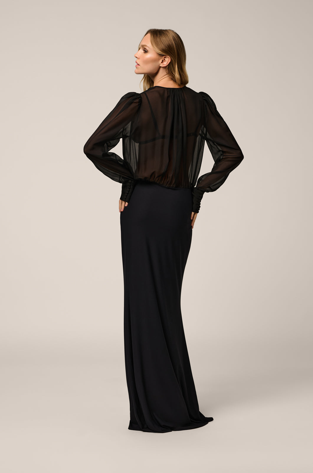Long sleeve maxi dress with open tie in front and chiffon-covered buttons back view