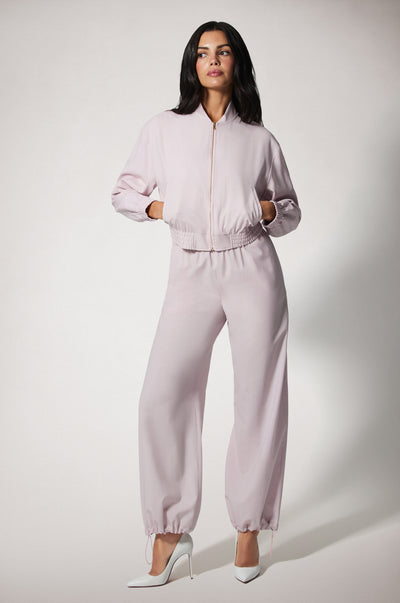 Light Pink Cropped Cinched End Mock Neck Gold Zip Up Bomber Jacket Front