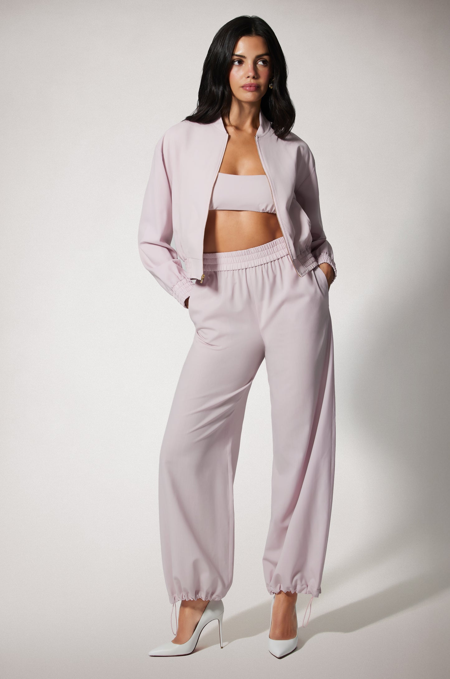 Light Pink Cropped Cinched End Mock Neck Gold Zip Up Bomber Jacket and Pant Front
